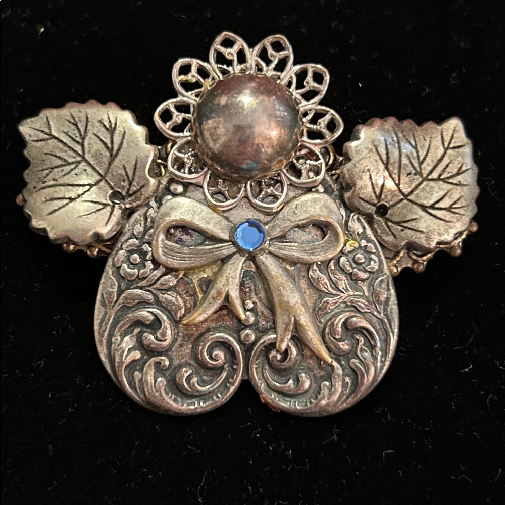 Silver Brooch with Blue Accent